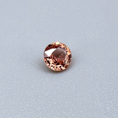 Natural Padparadscha Sapphire 0.37 ct from Songea Tanzania – heated round faceted gemstone with pink and peach hues