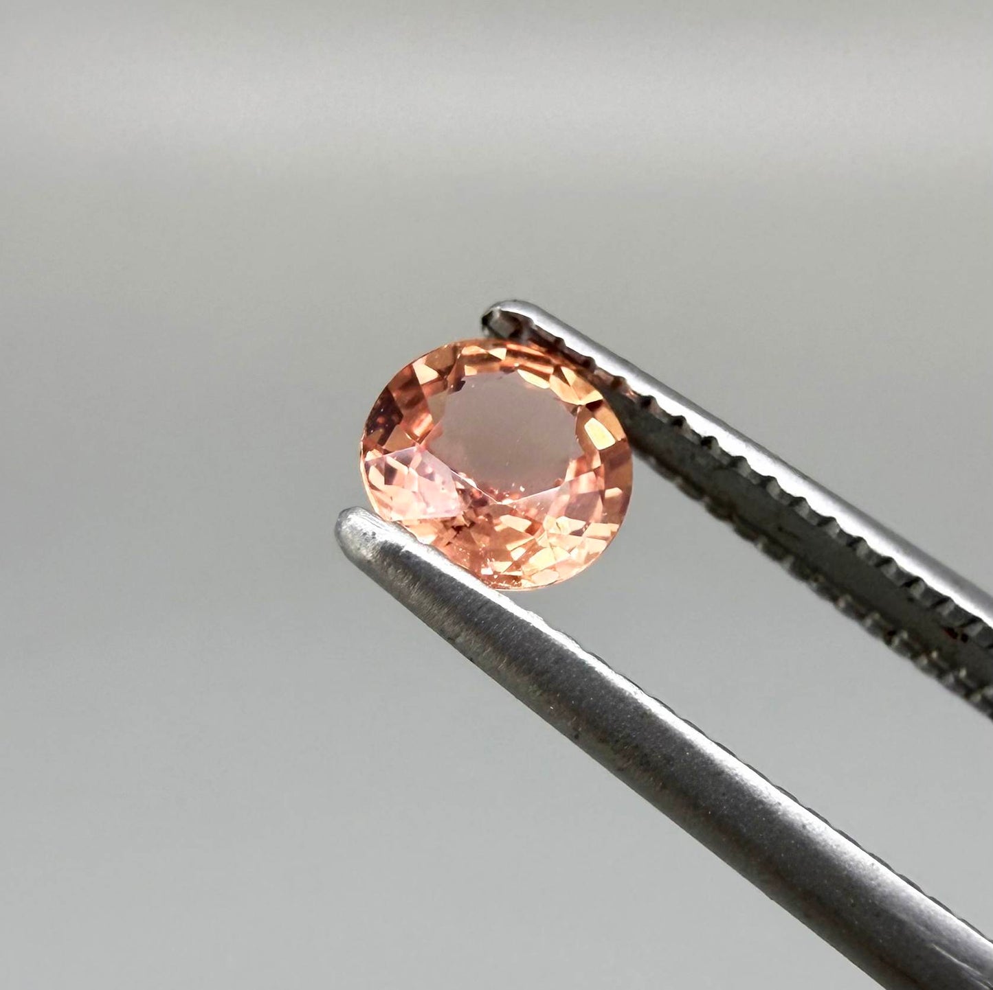 Natural Padparadscha Sapphire 0.37 ct from Songea Tanzania – heated round faceted gemstone with pink and peach hues