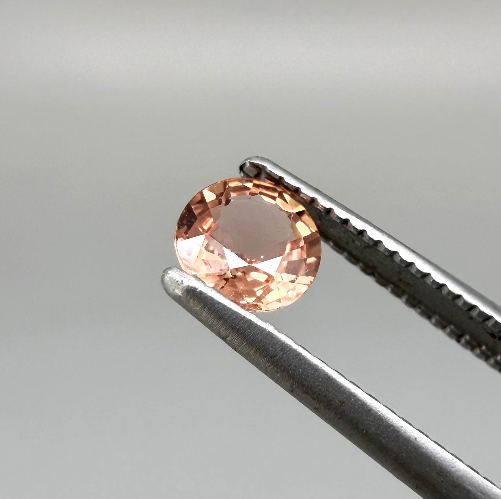 Natural Padparadscha Sapphire 0.37 ct from Songea Tanzania – heated round faceted gemstone with pink and peach hues