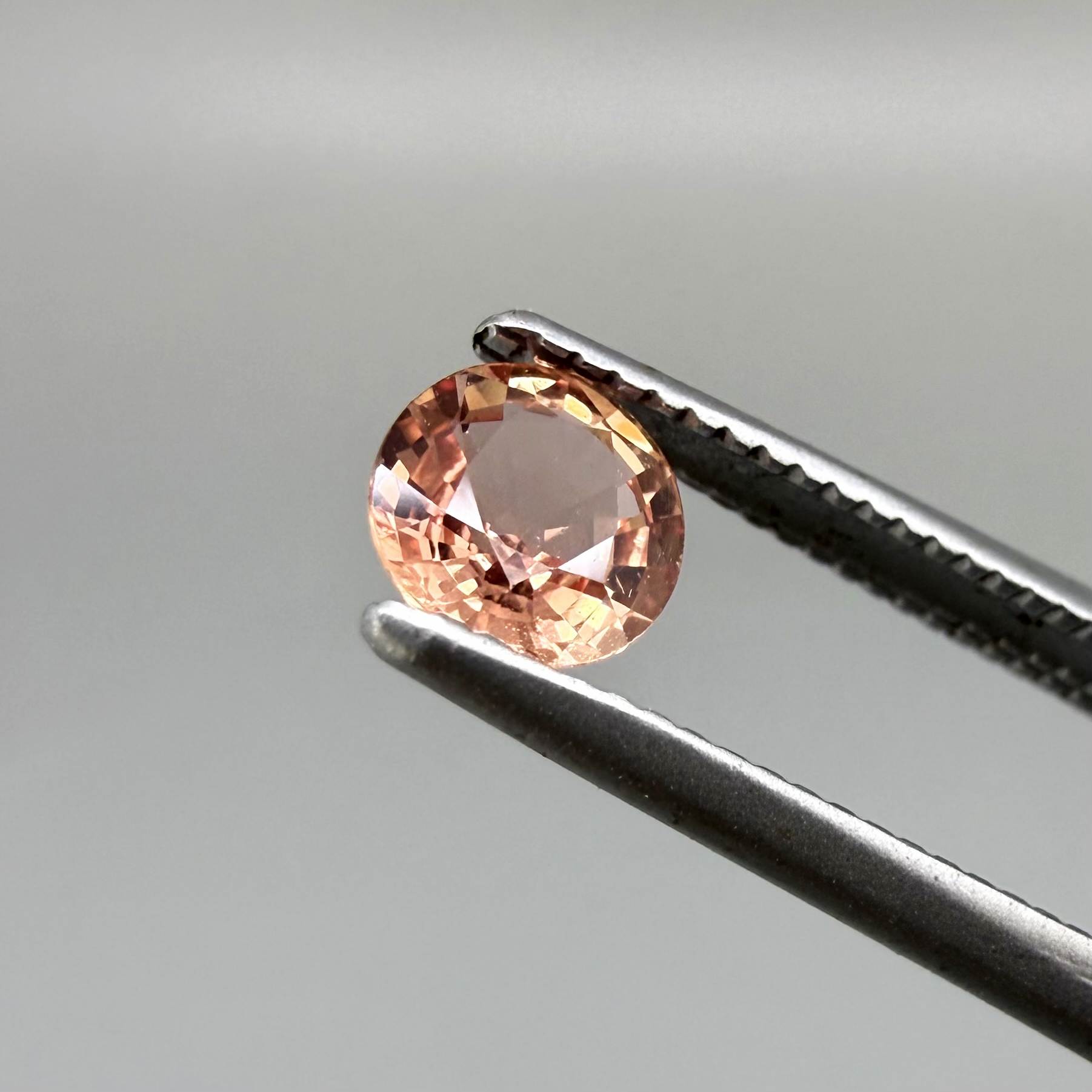 Natural Padparadscha Sapphire 0.37 ct from Songea Tanzania – heated round faceted gemstone with pink and peach hues