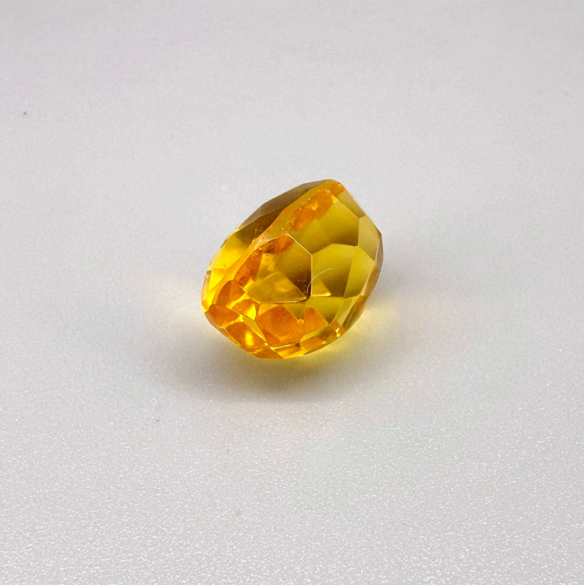 Natural Citrine 10.49 ct from Brazil – unheated oval faceted gemstone with vibrant golden-yellow color and exceptional clarity
