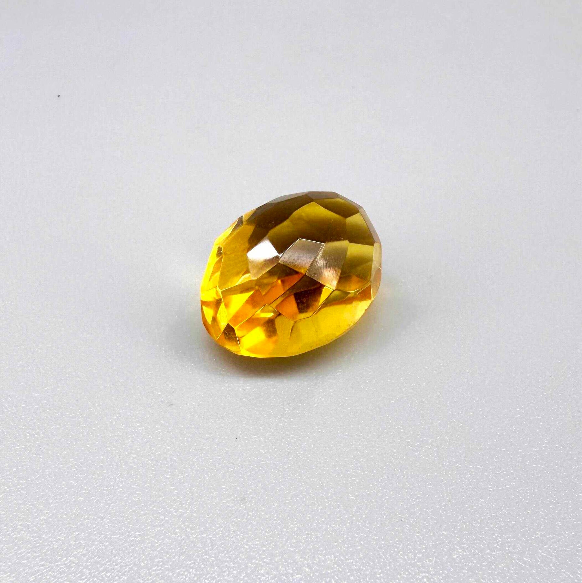 Natural Citrine 10.49 ct from Brazil – unheated oval faceted gemstone with vibrant golden-yellow color and exceptional clarity