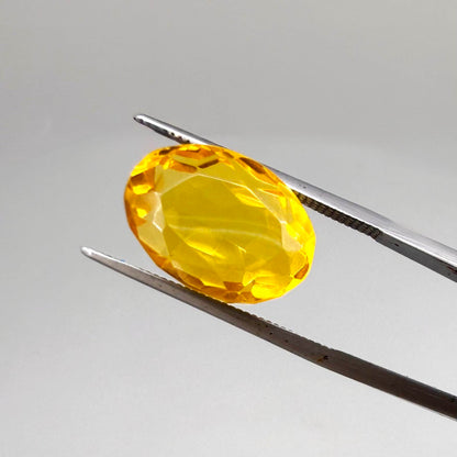 Natural Citrine 10.49 ct from Brazil – unheated oval faceted gemstone with vibrant golden-yellow color and exceptional clarity