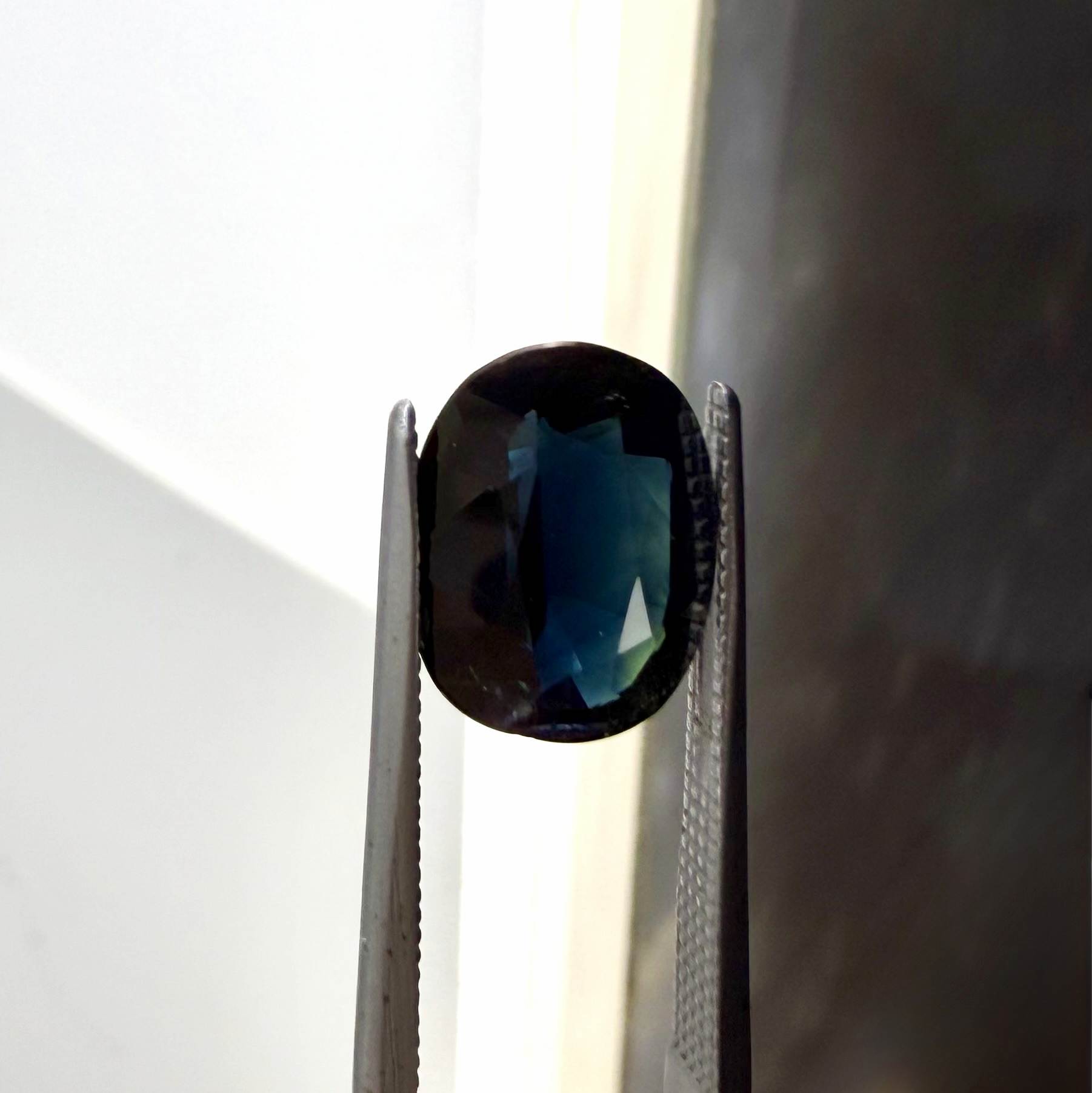 Natural heated dark blue Laos sapphire weighing 3.65 ct, oval cut with eye-clean clarity and a rich deep blue colour.