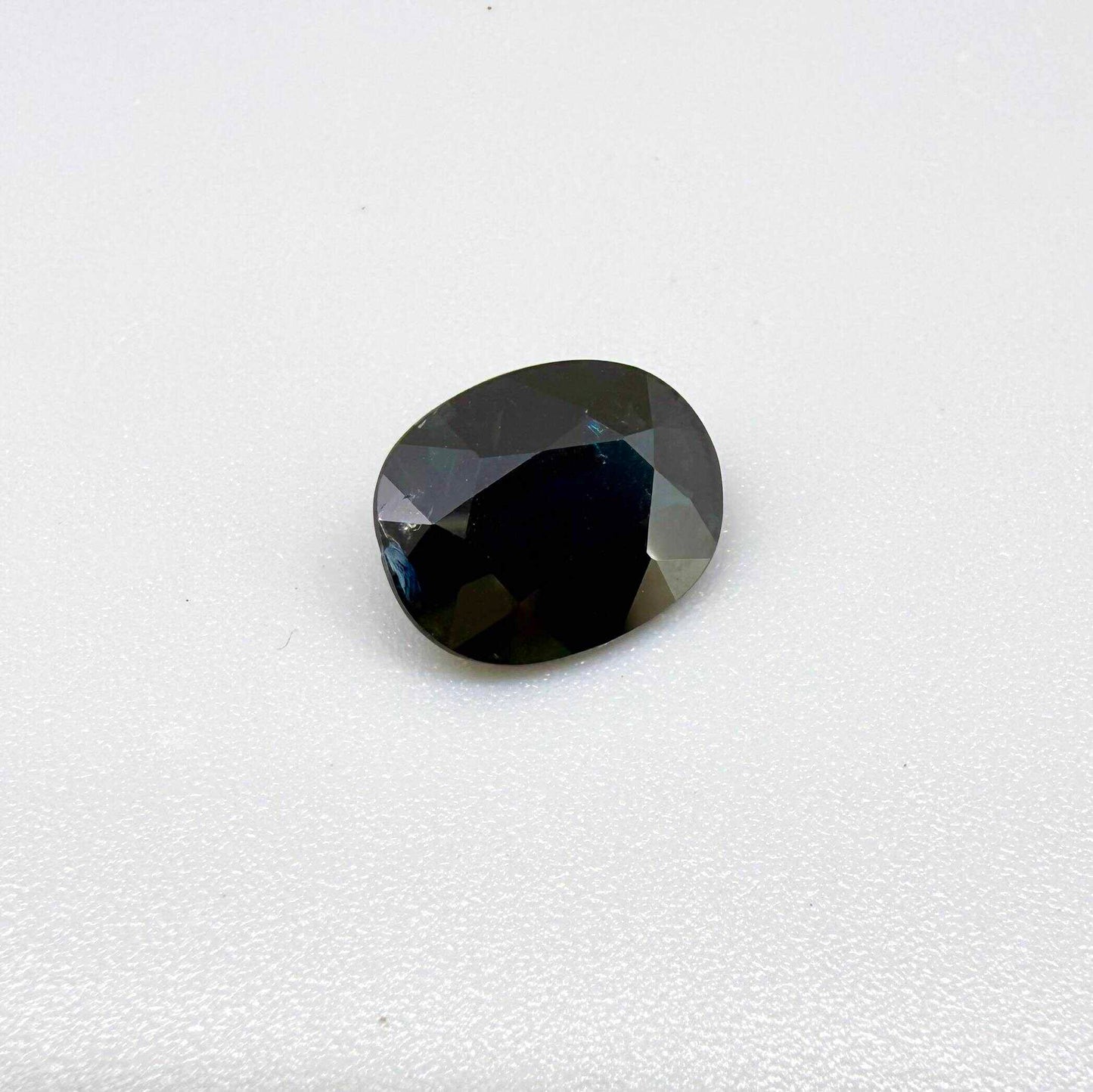 Natural heated dark blue Laos sapphire weighing 3.65 ct, oval cut with eye-clean clarity and a rich deep blue colour.
