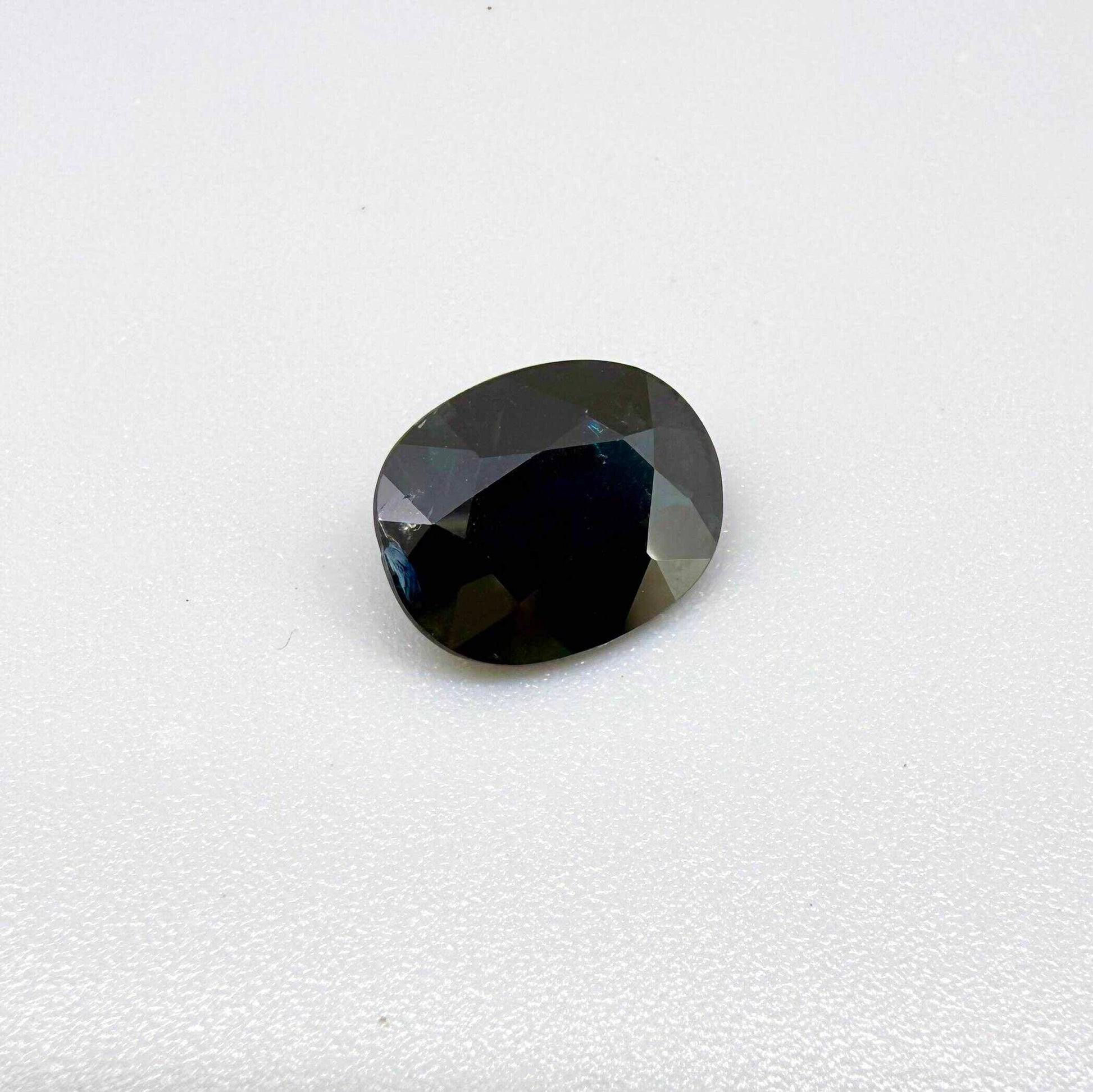 Natural heated dark blue Laos sapphire weighing 3.65 ct, oval cut with eye-clean clarity and a rich deep blue colour.