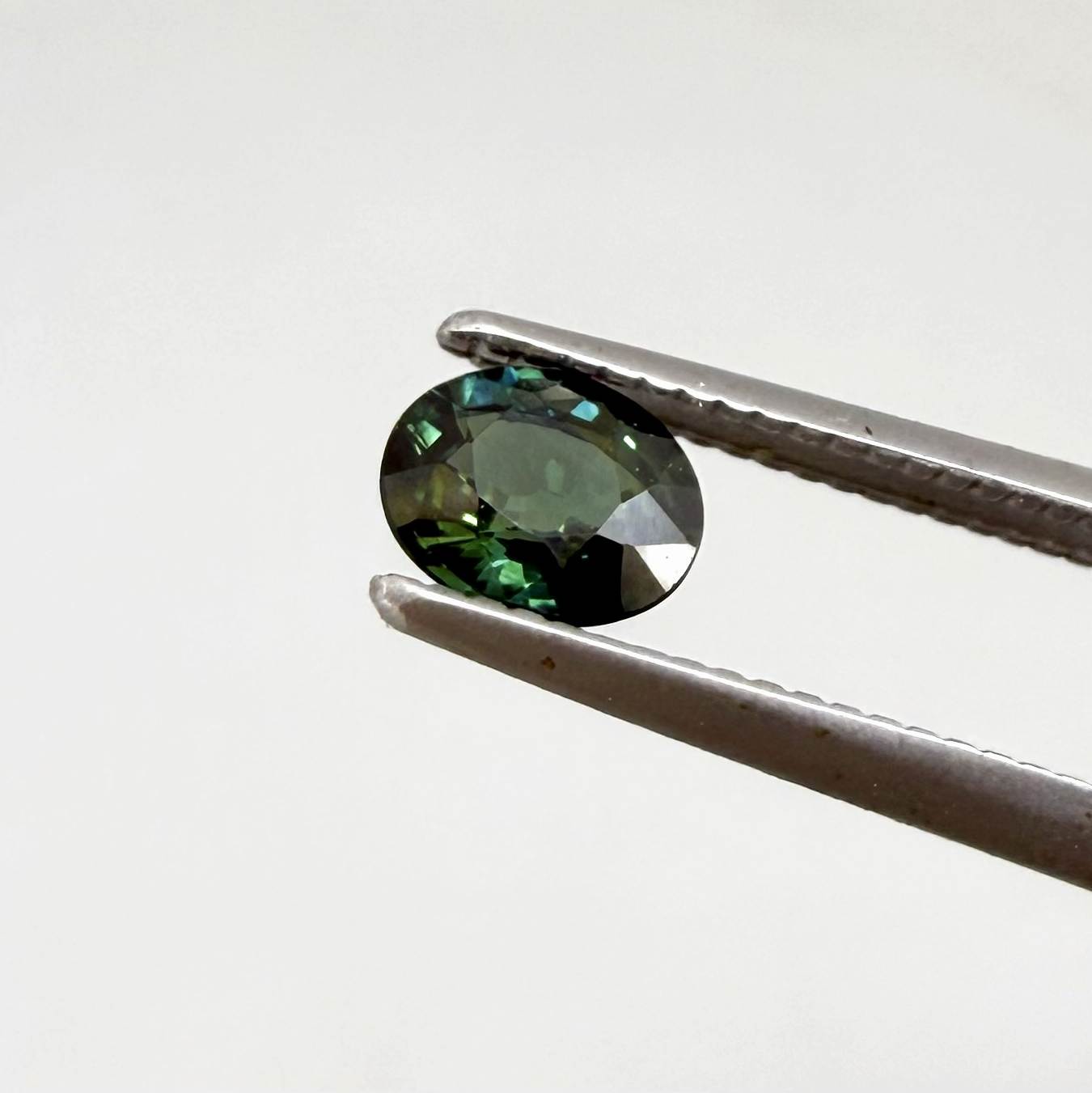 0.92 ct natural heated teal Laos sapphire matching pair with oval faceted cut for custom earrings