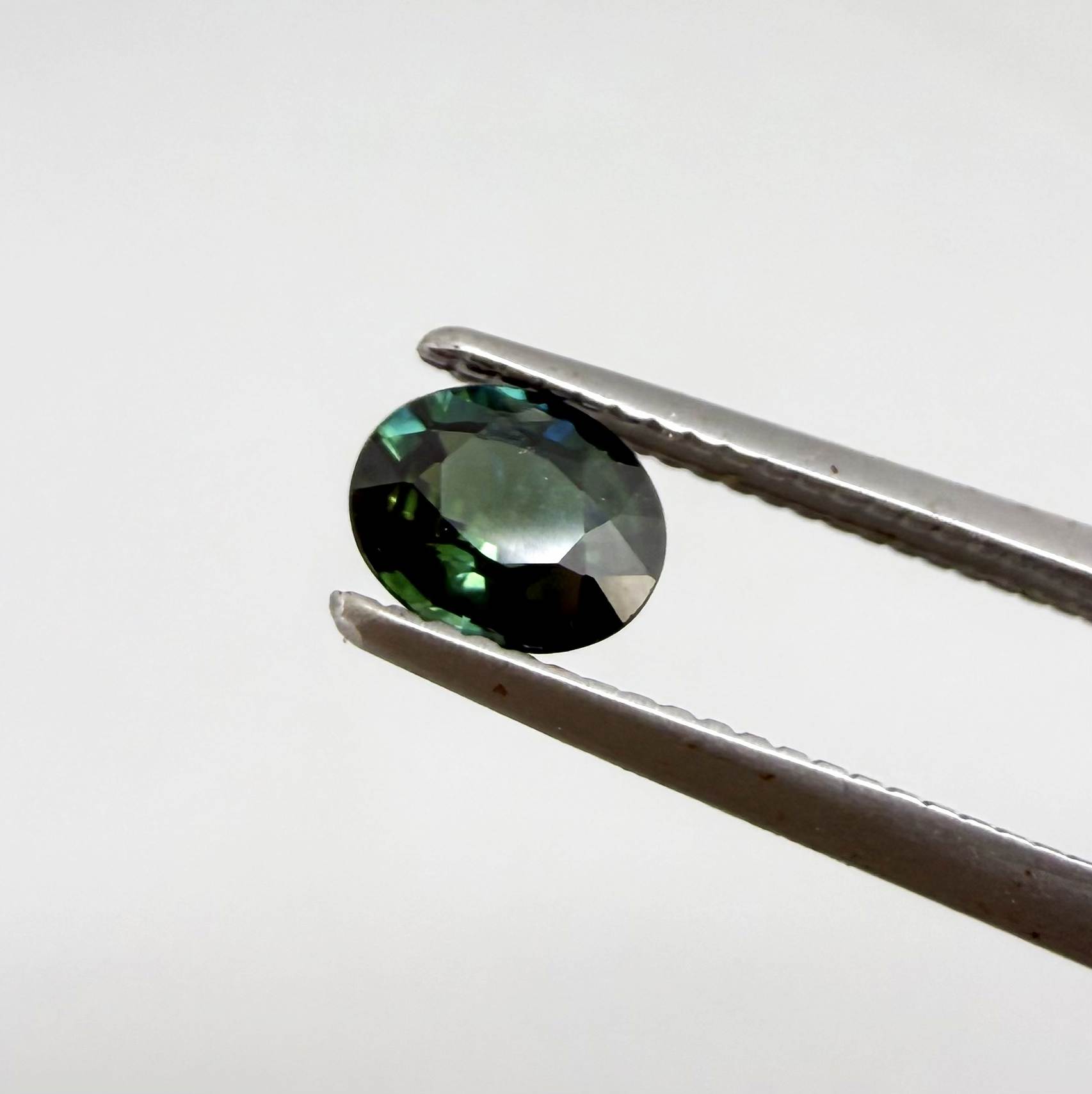 0.92 ct natural heated teal Laos sapphire matching pair with oval faceted cut for custom earrings