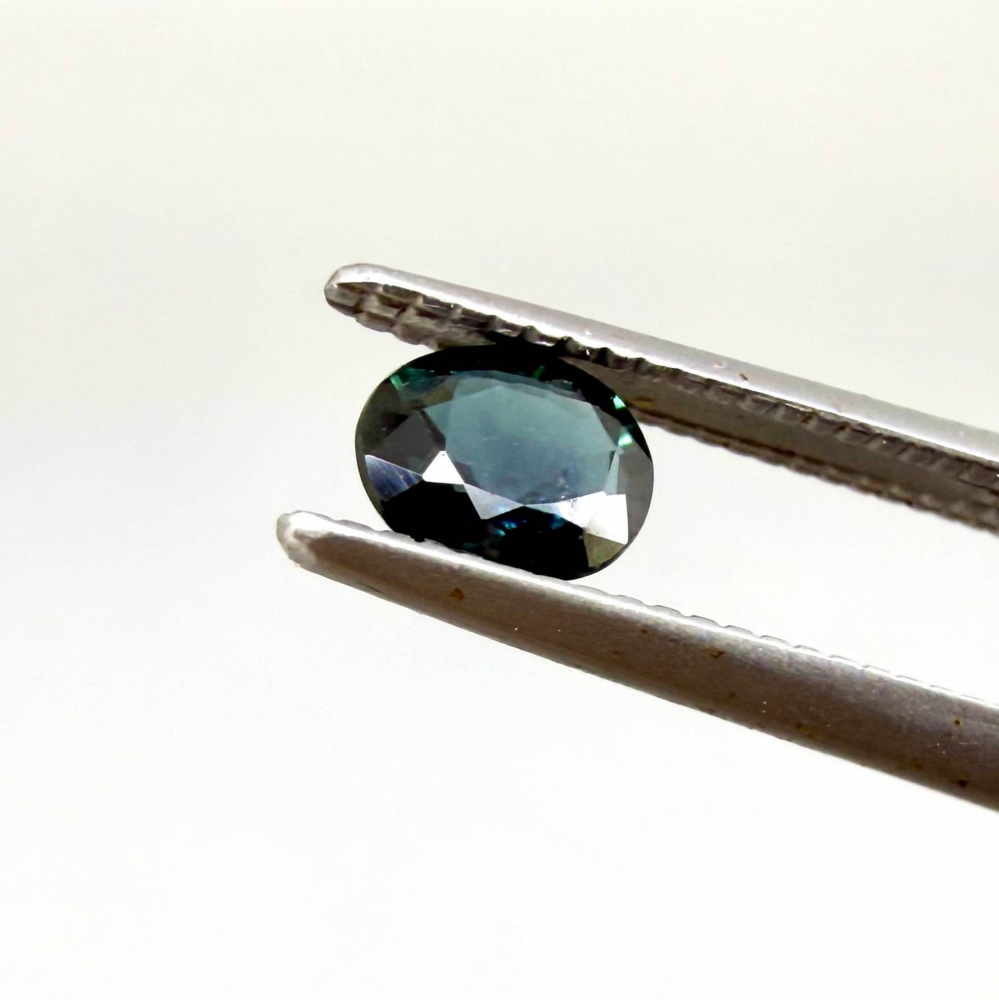 0.92 ct natural heated teal Laos sapphire matching pair with oval faceted cut for custom earrings