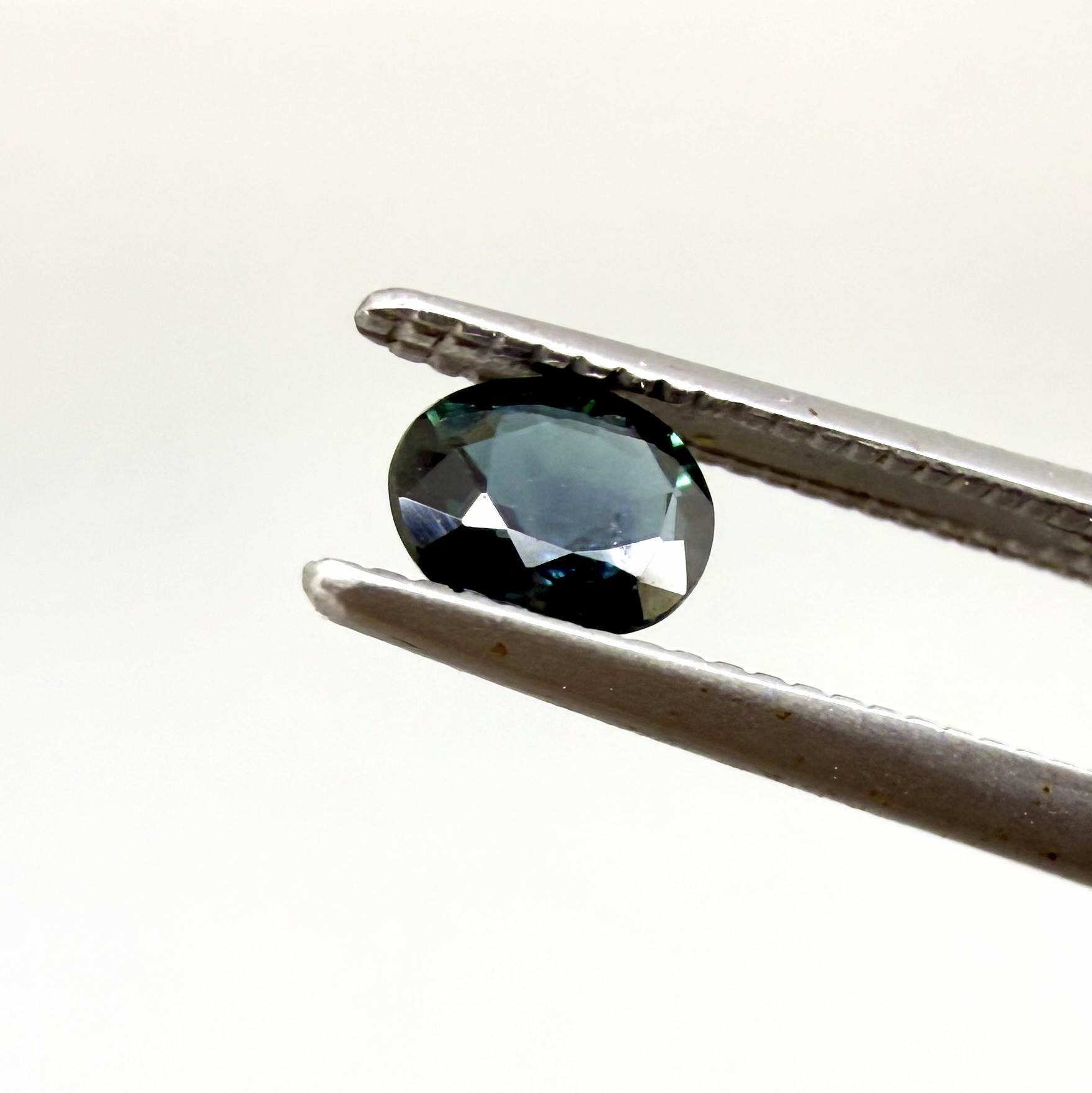 0.92 ct natural heated teal Laos sapphire matching pair with oval faceted cut for custom earrings