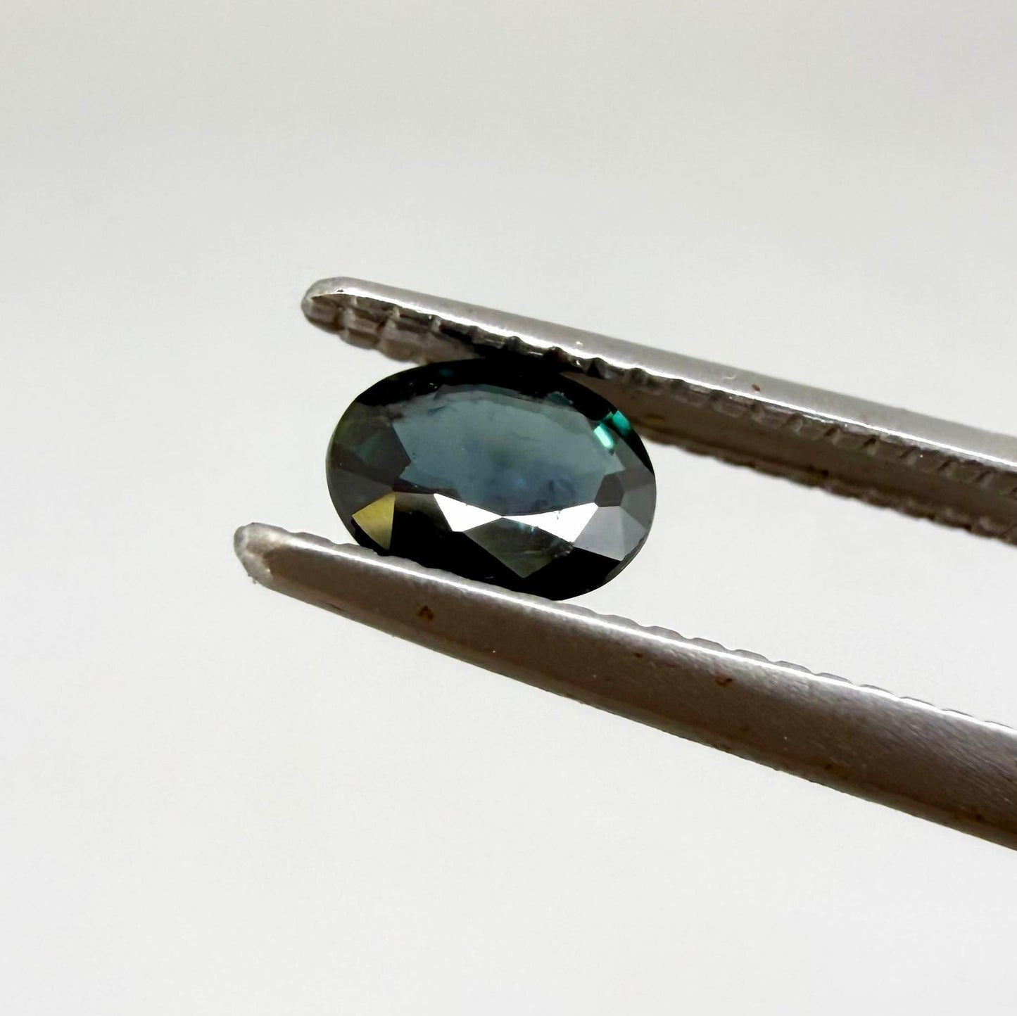 0.92 ct natural heated teal Laos sapphire matching pair with oval faceted cut for custom earrings