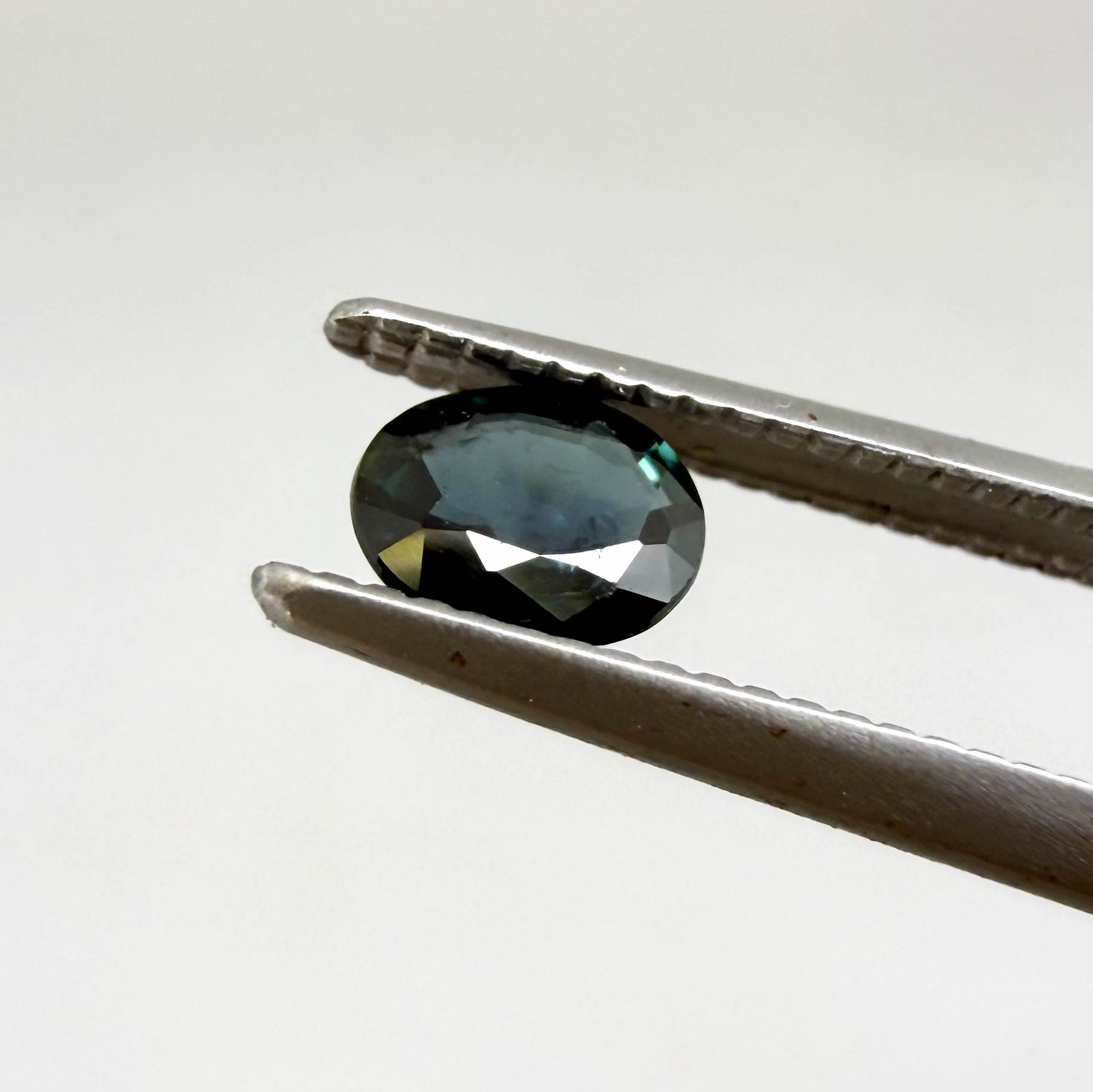 0.92 ct natural heated teal Laos sapphire matching pair with oval faceted cut for custom earrings