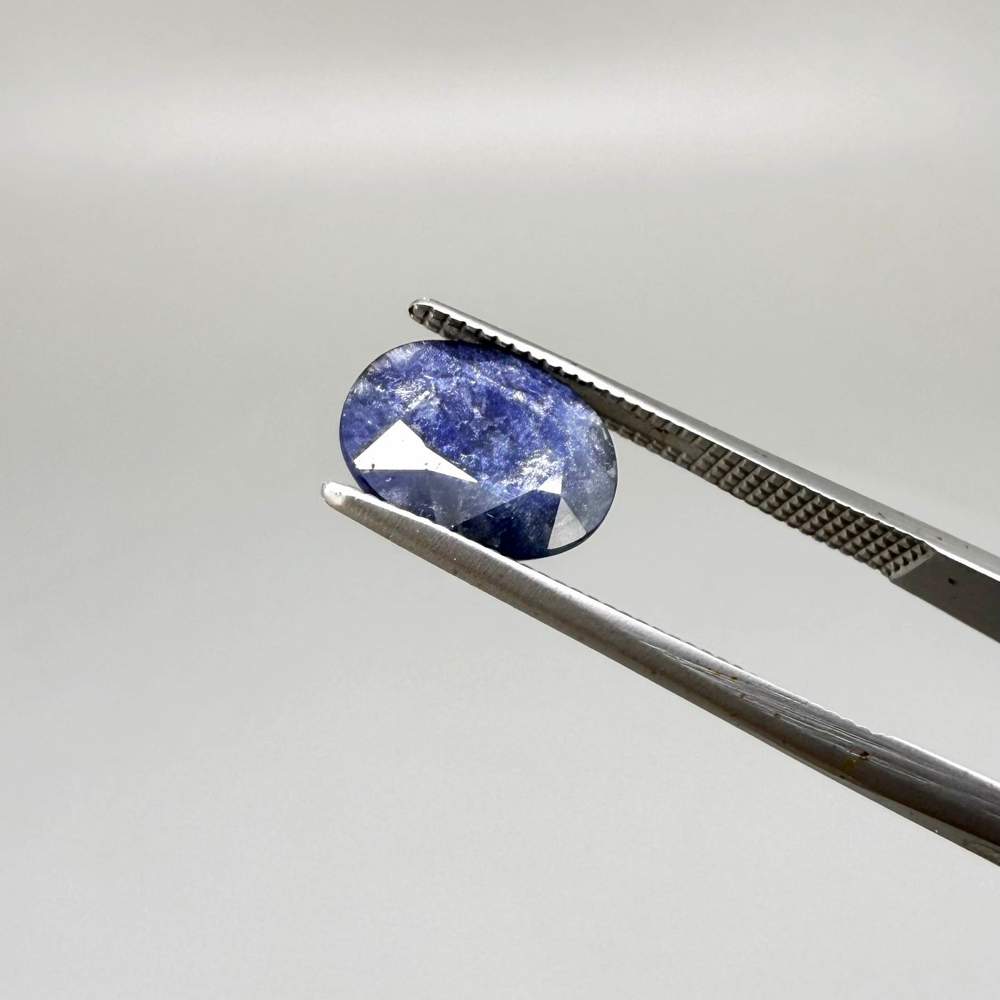 2.37 ct natural heated Bangkaja sapphire from Thailand with oval faceted cut and distinctive silky sheen