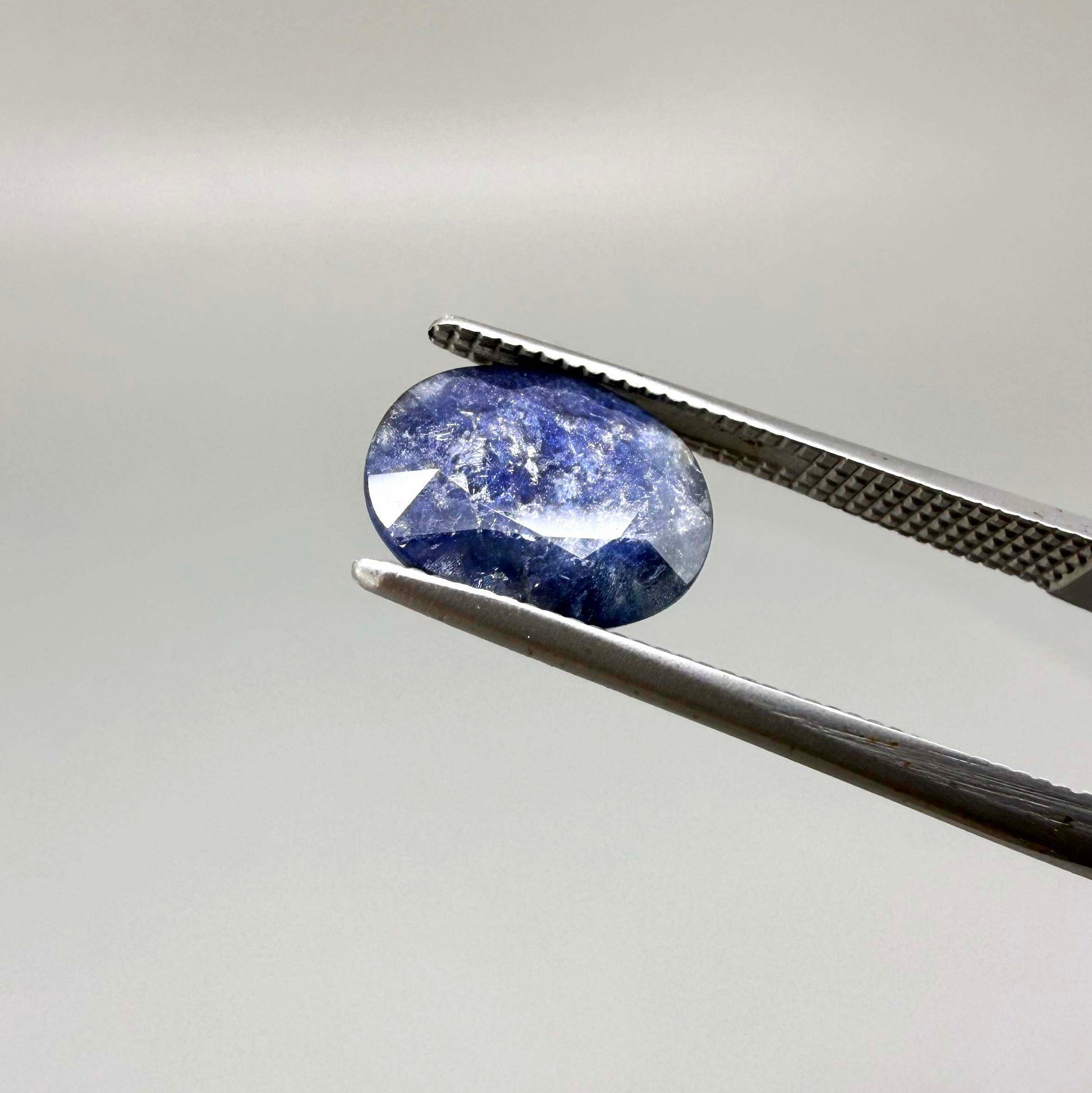 2.37 ct natural heated Bangkaja sapphire from Thailand with oval faceted cut and distinctive silky sheen