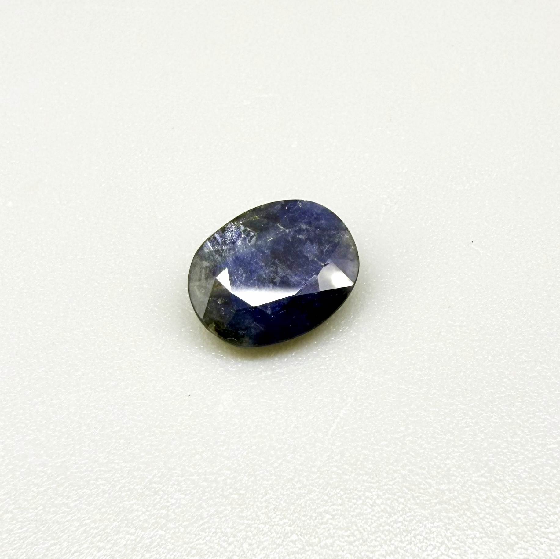 2.37 ct natural heated Bangkaja sapphire from Thailand with oval faceted cut and distinctive silky sheen