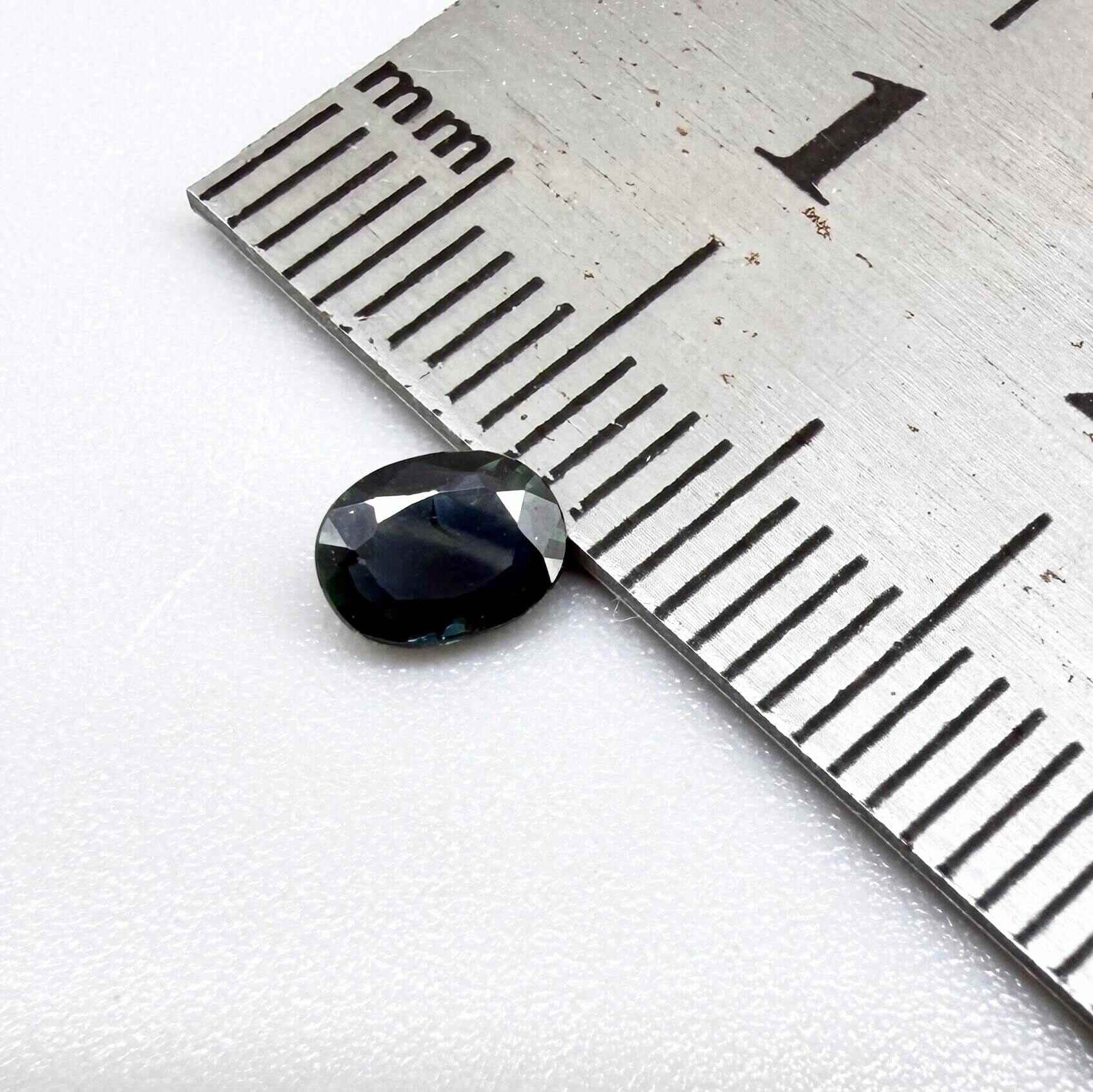 0.43 ct natural teal Laos sapphire with oval faceted cut and rich teal colour