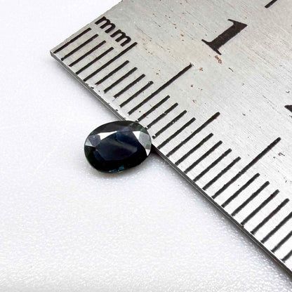 0.43 ct natural teal Laos sapphire with oval faceted cut and rich teal colour