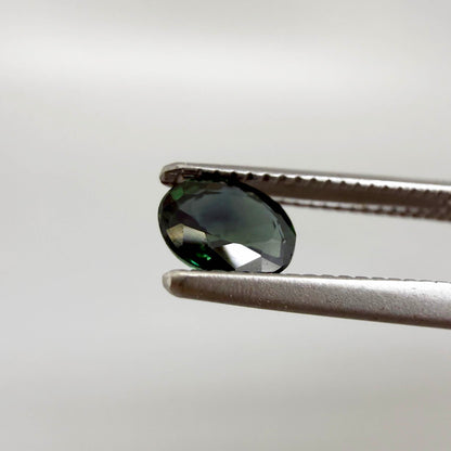 0.30 ct natural green Laos sapphire with oval faceted cut and rich green colour