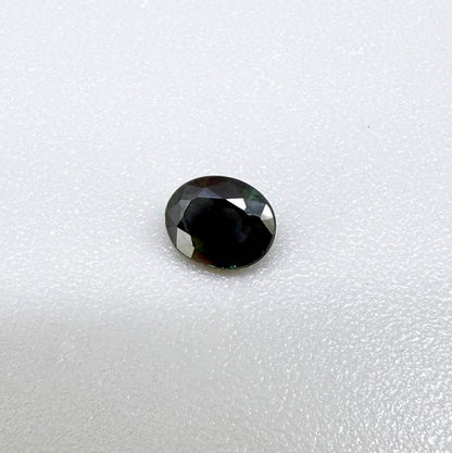 0.30 ct natural green Laos sapphire with oval faceted cut and rich green colour