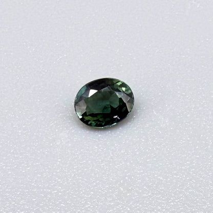 0.30 ct natural teal Laos sapphire with oval faceted cut and vibrant teal colour