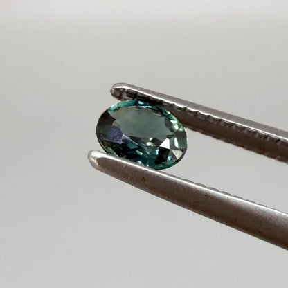 0.30 ct natural teal Laos sapphire with oval faceted cut and vibrant teal colour