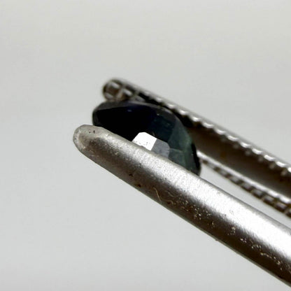 0.34 ct natural deep teal Laos sapphire with oval faceted cut and rich teal colour