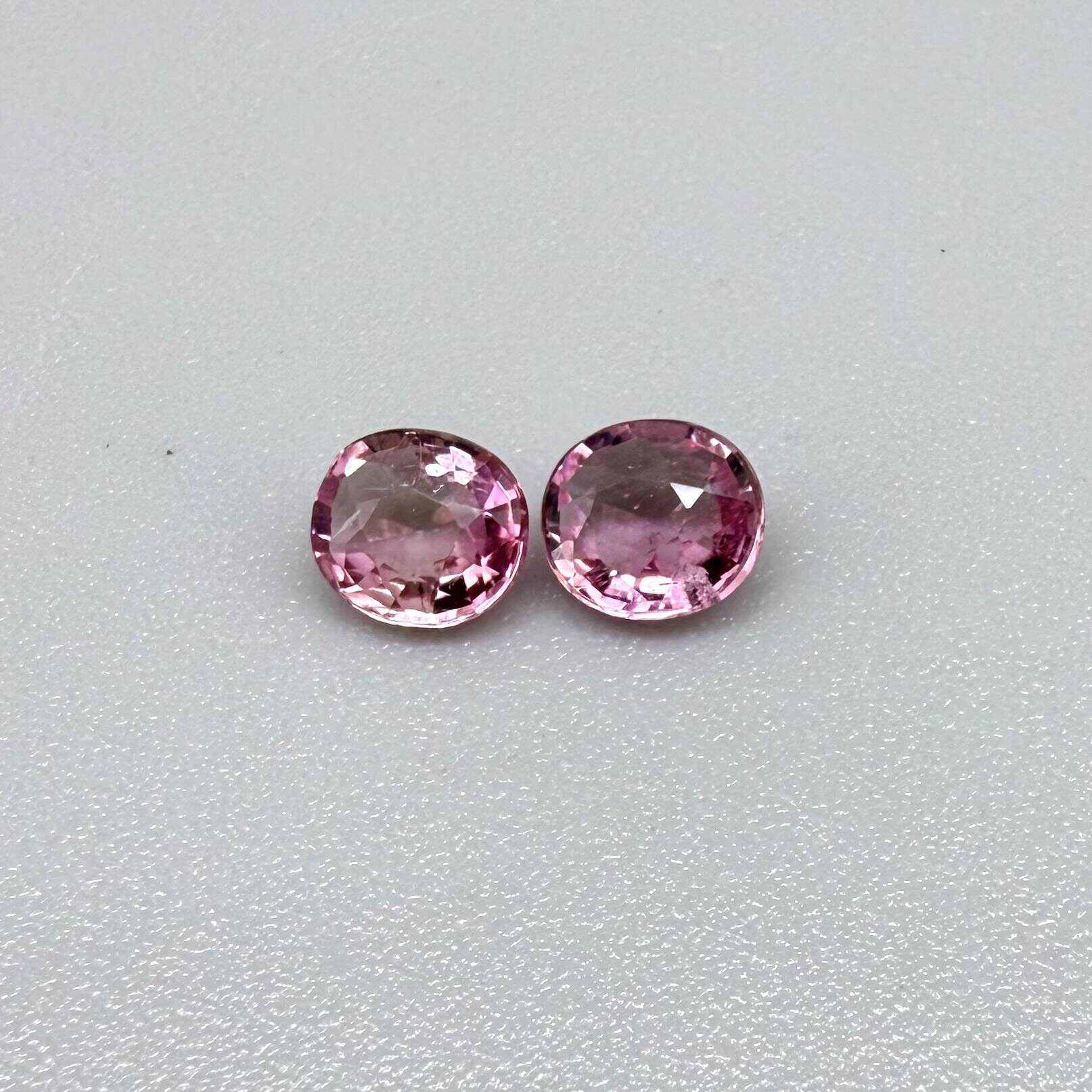 Natural untreated pink tourmaline matching pair, 0.84 ct total weight, round cut gemstones from Nigeria with soft pink colour for custom earrings.