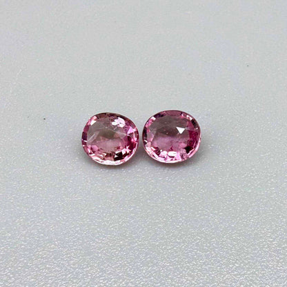 Natural untreated pink tourmaline matching pair, 0.84 ct total weight, round cut gemstones from Nigeria with soft pink colour for custom earrings.