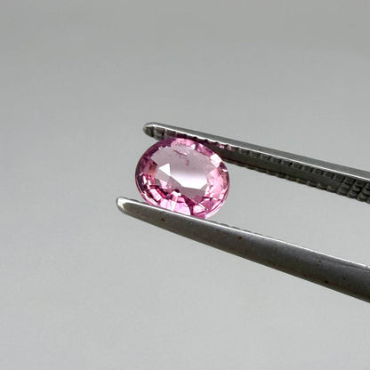 Natural untreated pink tourmaline matching pair, 0.84 ct total weight, round cut gemstones from Nigeria with soft pink colour for custom earrings.