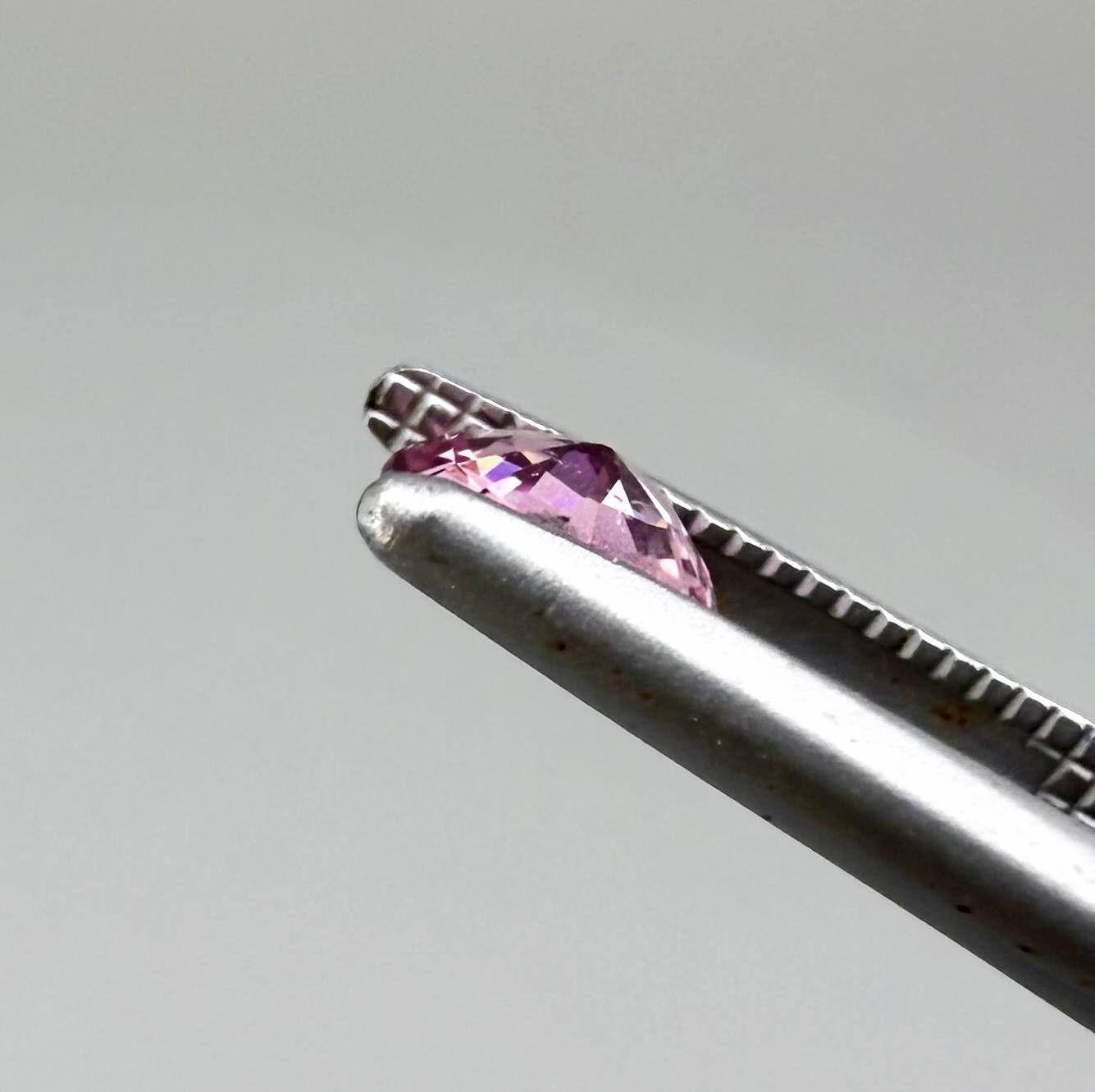 Natural untreated pink tourmaline matching pair, 0.84 ct total weight, round cut gemstones from Nigeria with soft pink colour for custom earrings.