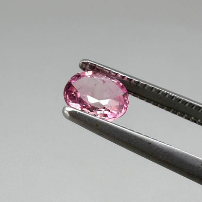 Natural untreated pink tourmaline matching pair, 0.84 ct total weight, round cut gemstones from Nigeria with soft pink colour for custom earrings.