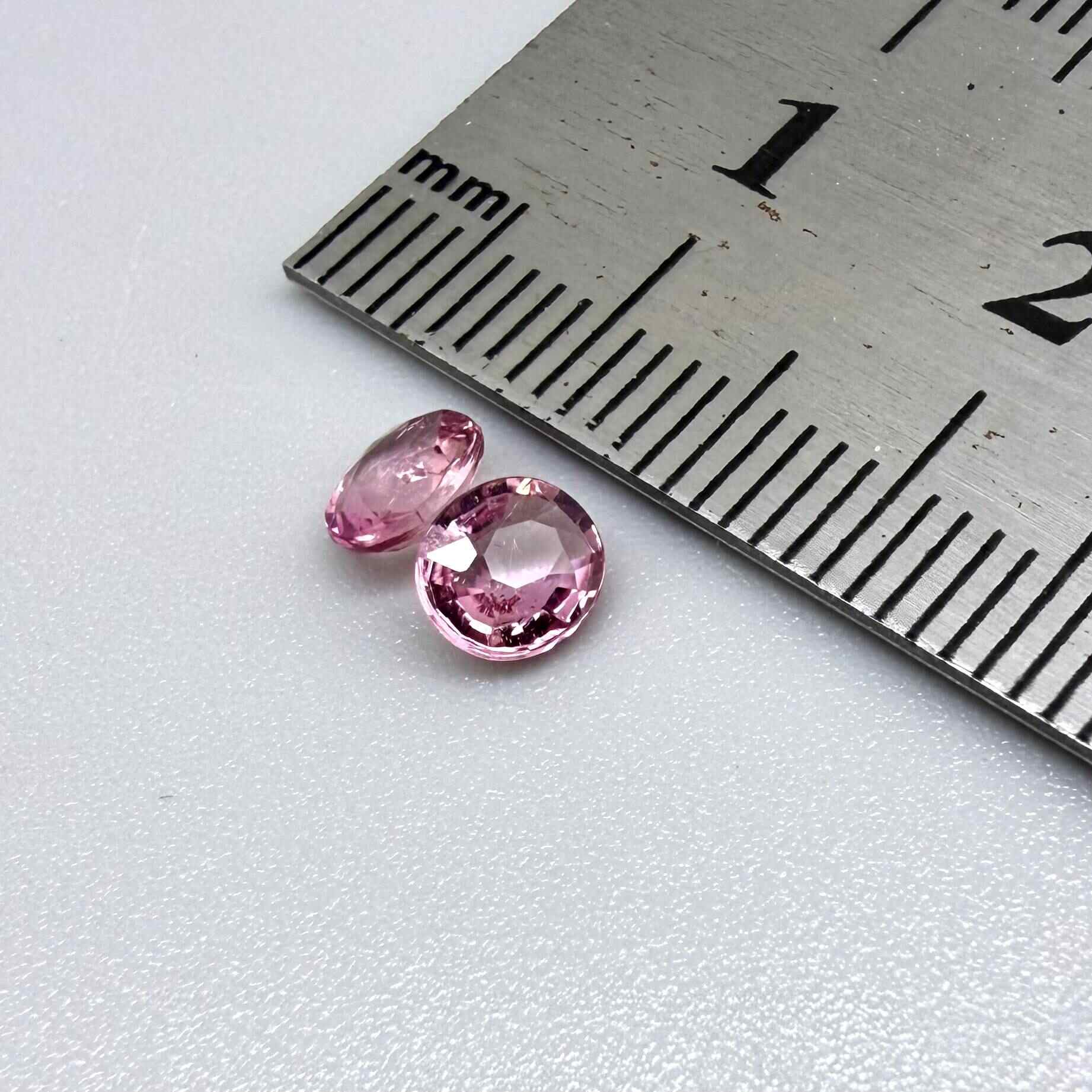 Natural untreated pink tourmaline matching pair, 0.84 ct total weight, round cut gemstones from Nigeria with soft pink colour for custom earrings.