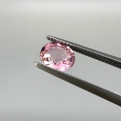 Natural untreated pink tourmaline, 0.72 ct oval cut from Nigeria with bright pink colour, eye-clean clarity and excellent brilliance.