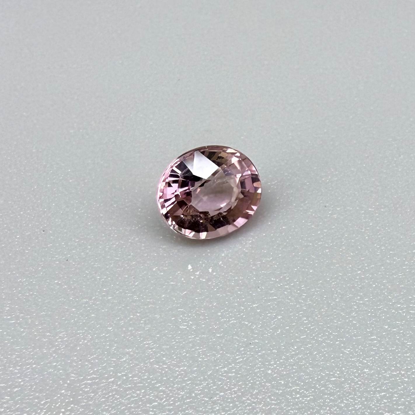 Natural untreated pink tourmaline, 0.72 ct oval cut from Nigeria with bright pink colour, eye-clean clarity and excellent brilliance.