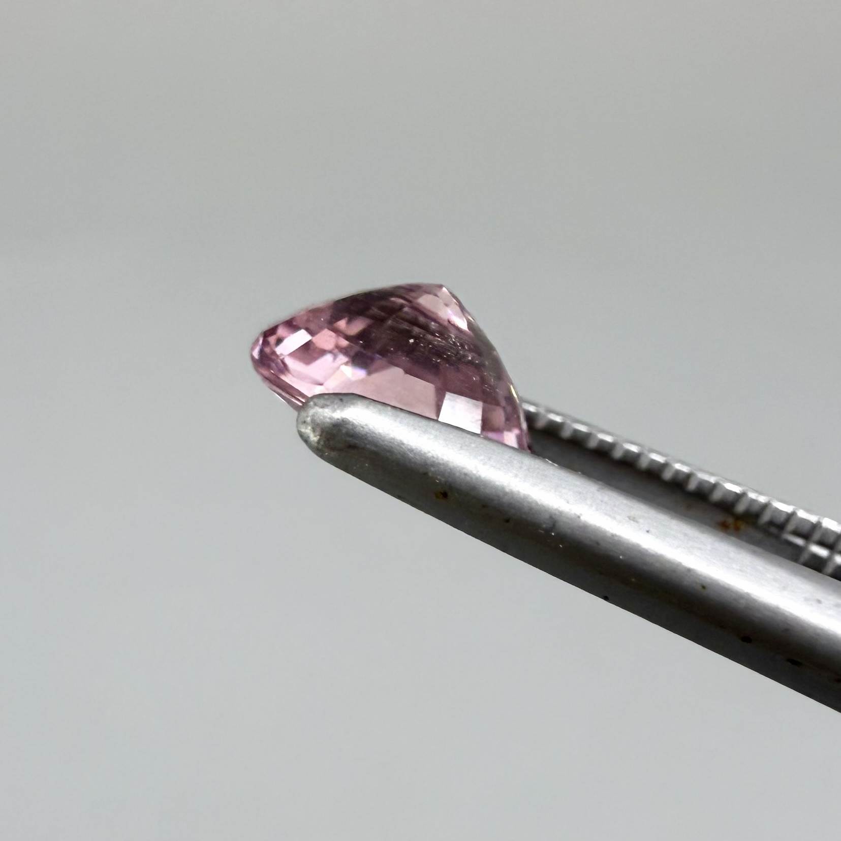 Natural untreated pink tourmaline, 0.72 ct oval cut from Nigeria with bright pink colour, eye-clean clarity and excellent brilliance.