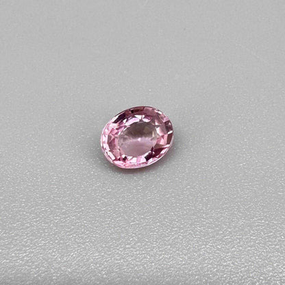 Natural untreated pink tourmaline, 0.95 ct oval cut from Nigeria with bright pink colour, eye-clean clarity and excellent brilliance.