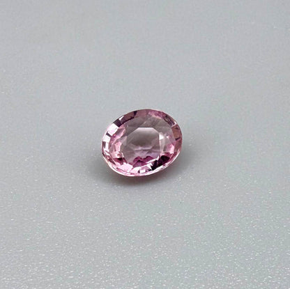 Natural untreated pink tourmaline, 0.95 ct oval cut from Nigeria with bright pink colour, eye-clean clarity and excellent brilliance.