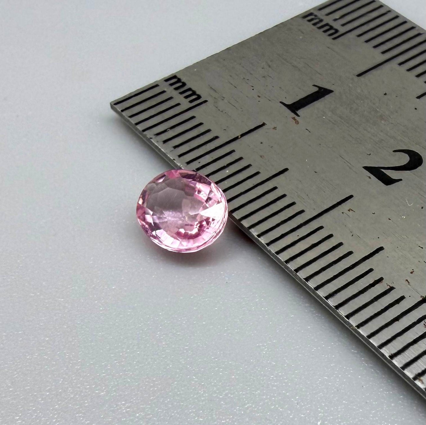 Natural untreated pink tourmaline, 0.95 ct oval cut from Nigeria with bright pink colour, eye-clean clarity and excellent brilliance.
