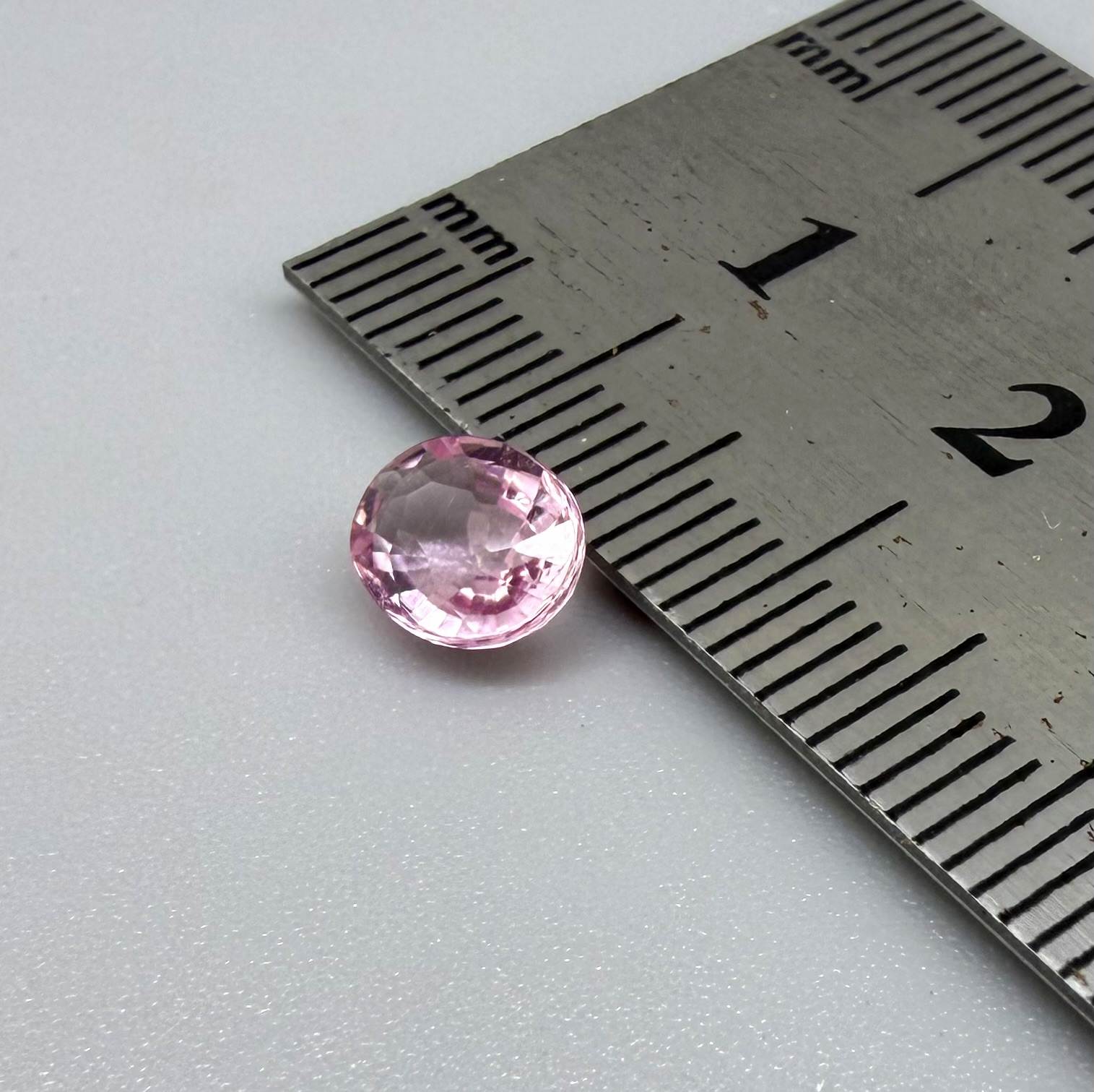 Natural untreated pink tourmaline, 0.95 ct oval cut from Nigeria with bright pink colour, eye-clean clarity and excellent brilliance.