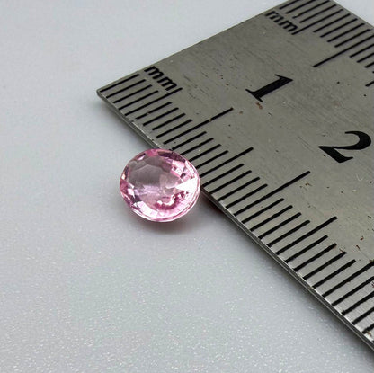 Natural untreated pink tourmaline, 0.95 ct oval cut from Nigeria with bright pink colour, eye-clean clarity and excellent brilliance.