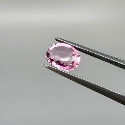 Natural untreated pink tourmaline, 0.95 ct oval cut from Nigeria with bright pink colour, eye-clean clarity and excellent brilliance.