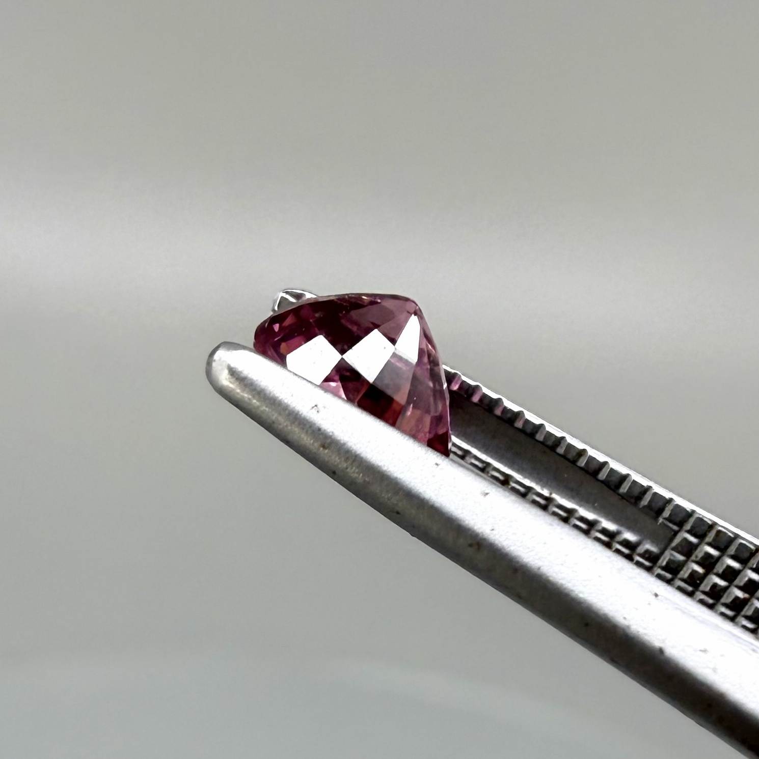 Natural untreated pink tourmaline, 0.56 ct oval cut from Nigeria with vivid pink colour, eye-clean clarity and excellent brilliance.