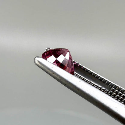 Natural untreated pink tourmaline, 0.56 ct oval cut from Nigeria with vivid pink colour, eye-clean clarity and excellent brilliance.