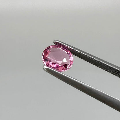 Natural untreated raspberry pink tourmaline, 0.41 ct round cut from Nigeria with vivid raspberry pink colour, eye-clean clarity and excellent brilliance.