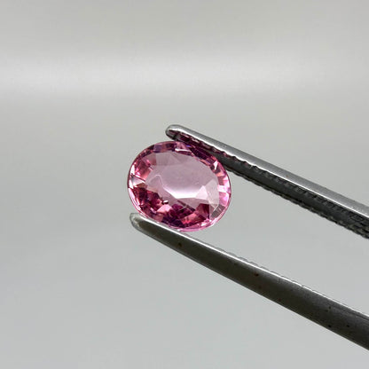 Natural untreated raspberry pink tourmaline, 0.41 ct round cut from Nigeria with vivid raspberry pink colour, eye-clean clarity and excellent brilliance.