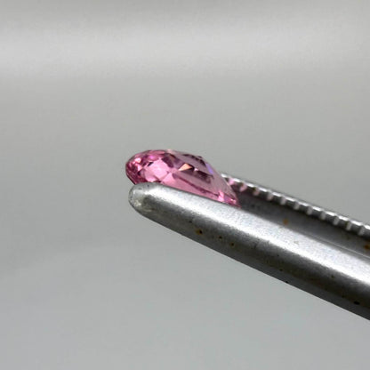 Natural untreated raspberry pink tourmaline, 0.41 ct round cut from Nigeria with vivid raspberry pink colour, eye-clean clarity and excellent brilliance.