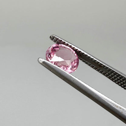 Natural untreated pink tourmaline, 0.67 ct oval cut from Nigeria with soft pink colour, eye-clean clarity and excellent brilliance.