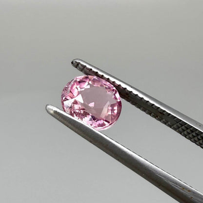 Natural untreated pink tourmaline, 0.67 ct oval cut from Nigeria with soft pink colour, eye-clean clarity and excellent brilliance.