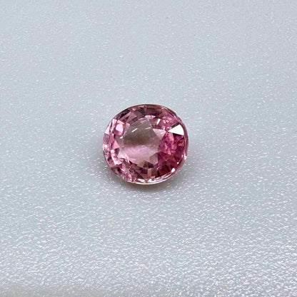 Natural untreated pink tourmaline, 0.67 ct oval cut from Nigeria with soft pink colour, eye-clean clarity and excellent brilliance.