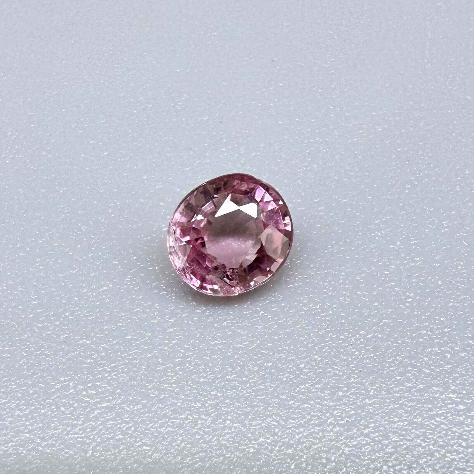 Natural untreated pink tourmaline, 0.67 ct oval cut from Nigeria with soft pink colour, eye-clean clarity and excellent brilliance.